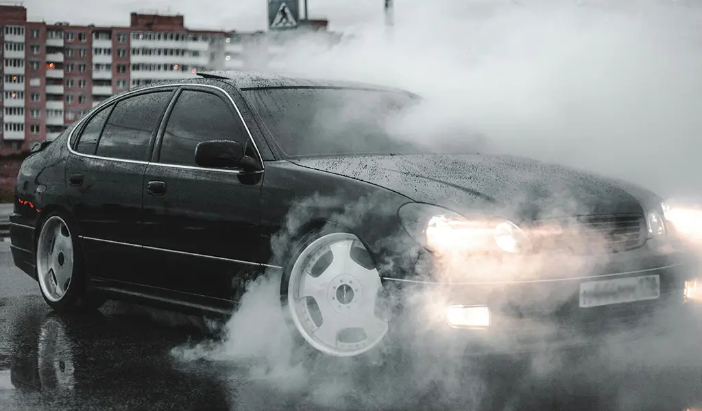 Car with a smoking hood