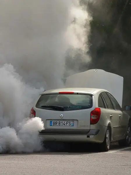 Car with a smoking hood