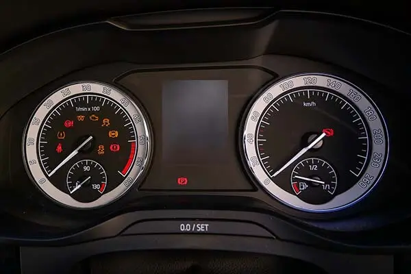 car dashboard with warning lights on