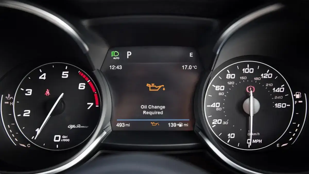 Alfa Romeo oil change warning light on the dashboard