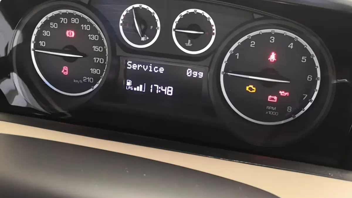 Lancia oil change warning light on the dashboard